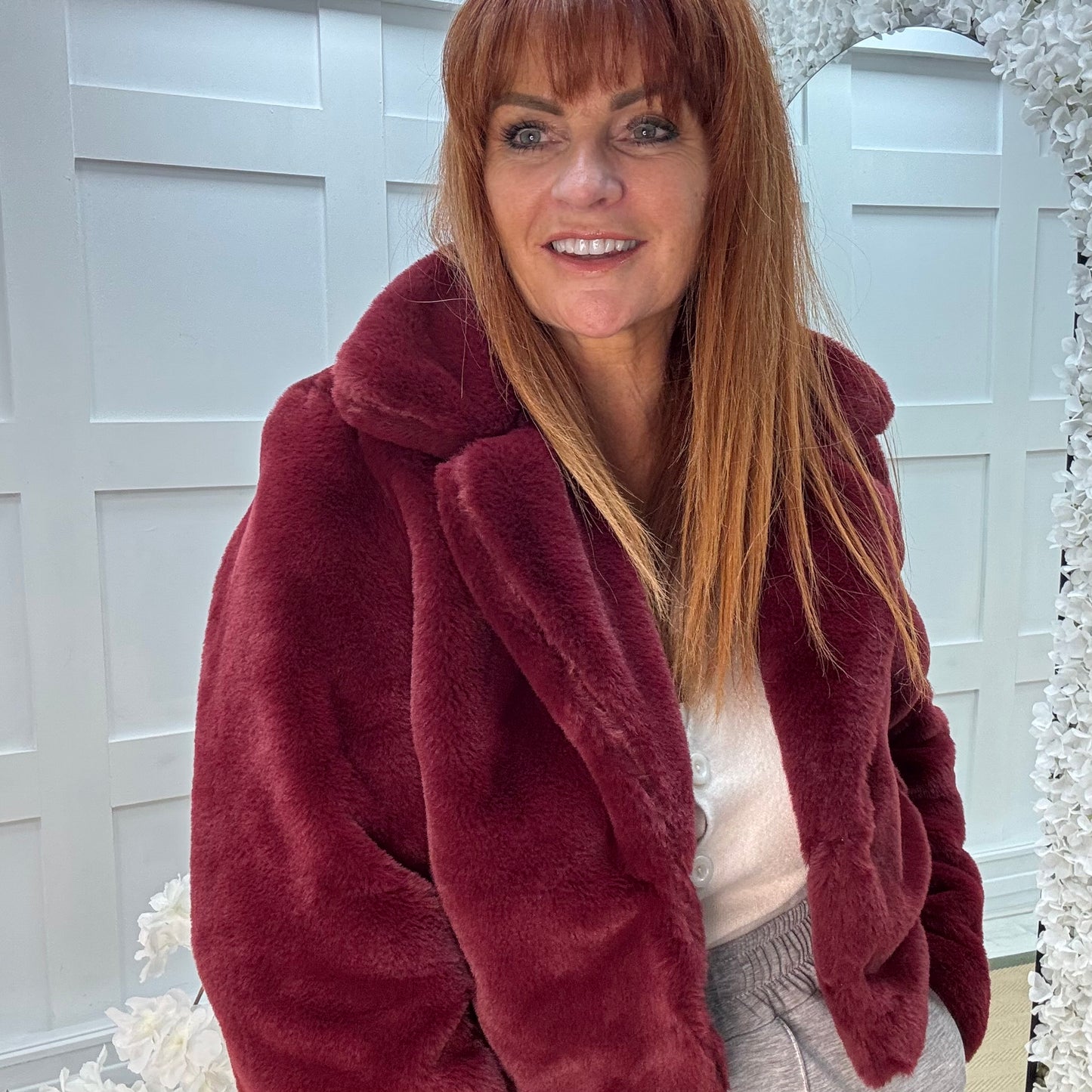 Paula: Burgundy short faux fur jacket . One size 10-16