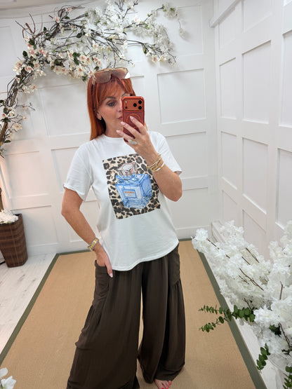 Stella: White diamanté leopard print perfume T shirt. One size: 12-18
