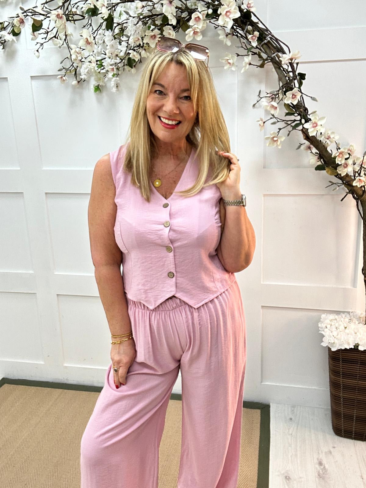 Cody: Pink waistcoat two piece trouser set. One size: 12-16