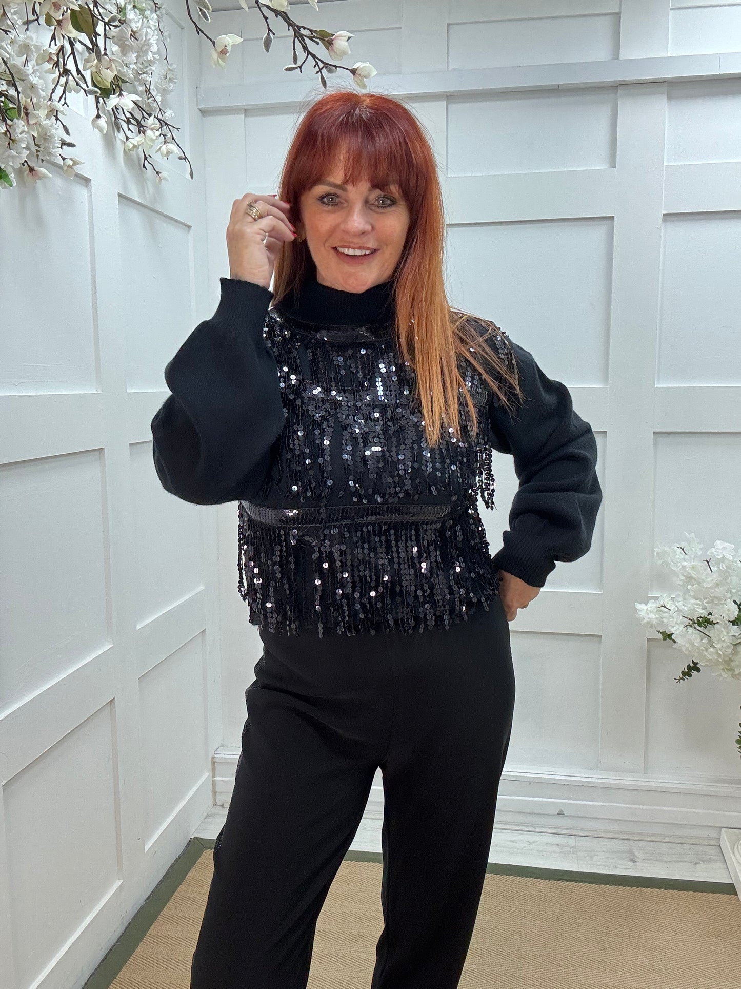 Pixi: Black tassel sequin knit. Two sizes.