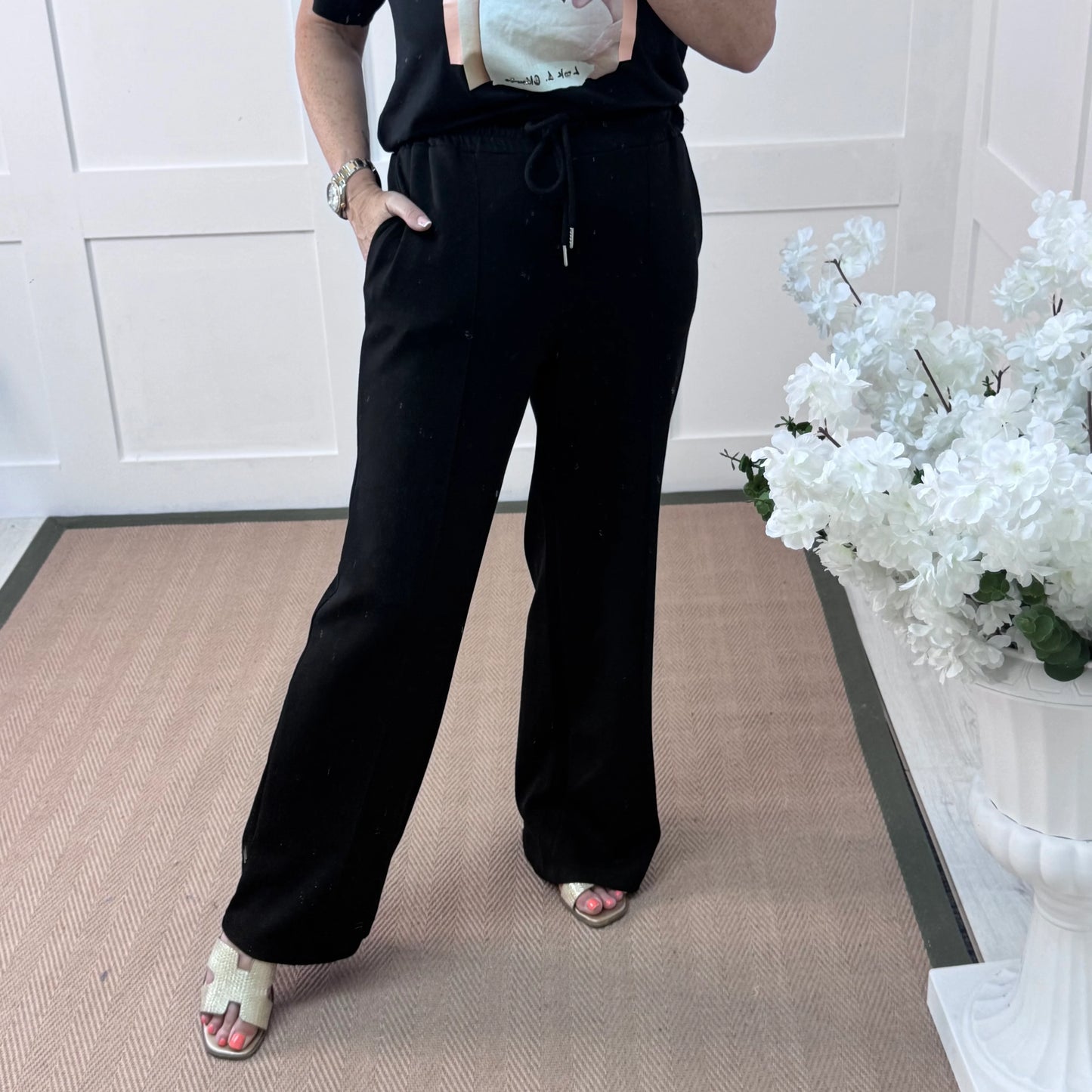 Trudy (Short): Black stretchy wide leg pocket trousers. One size: 10-16