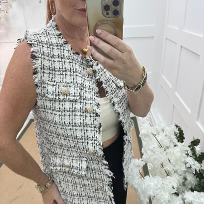 Devon: Black tweed button waistcoat. One size: 8-12