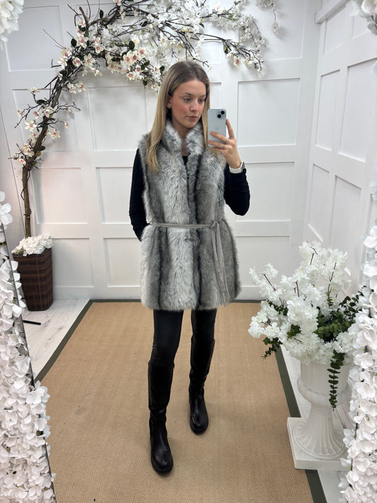 Kaya: Grey faux fur gilet. One size 10-16