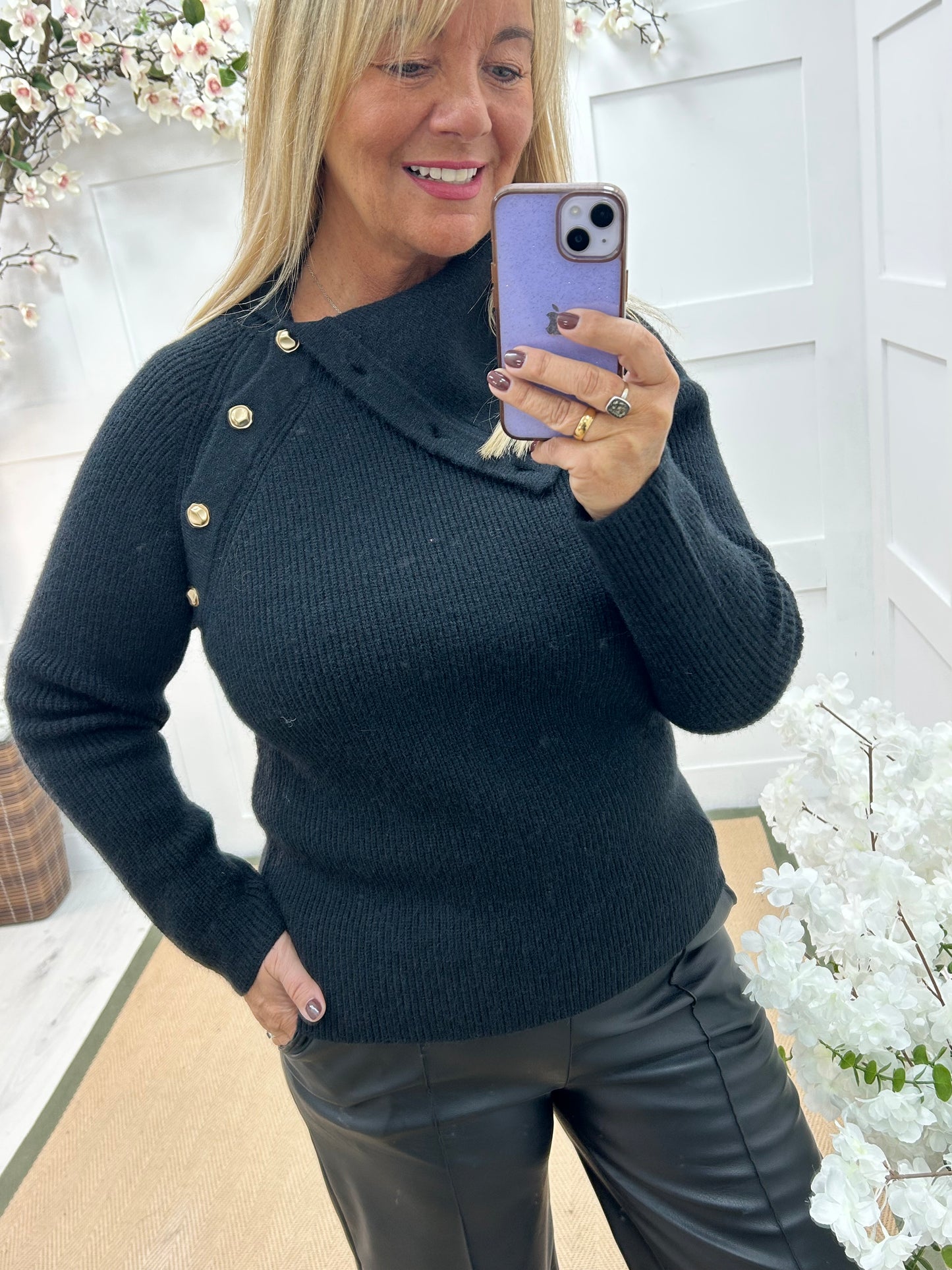 Rumer: Black split neck button top. One size 12-18