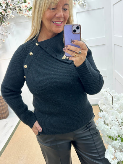 Rumer: Black split neck button top. One size 12-18