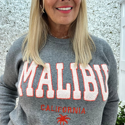 Melody: Grey textured MALIBU logo knitted top. One size 10-18