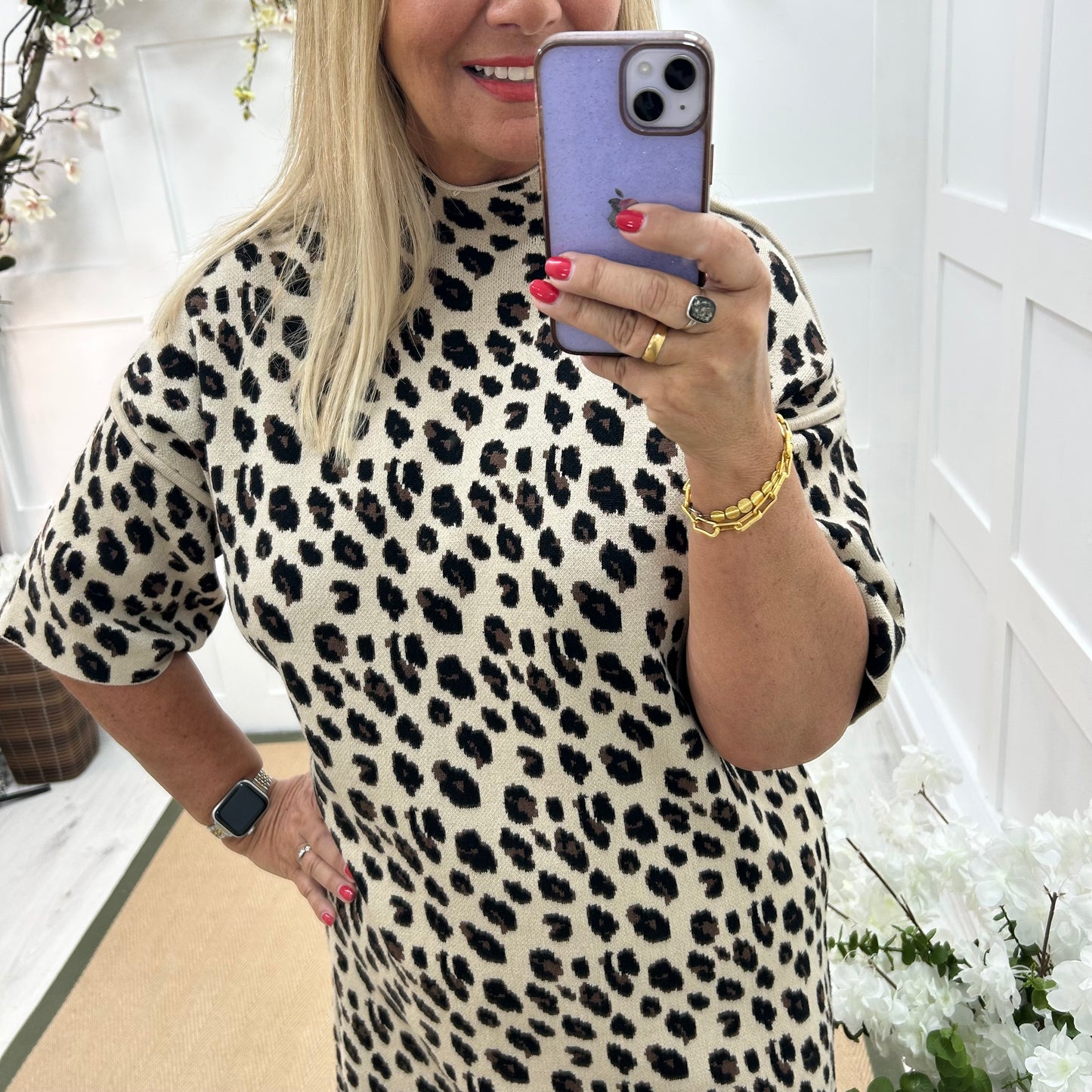 Purdy: Leopard print knitted dress. One size: 14-18