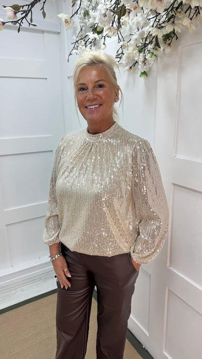Mia: Champagne/cream high neck sequin top. One size: 10-16