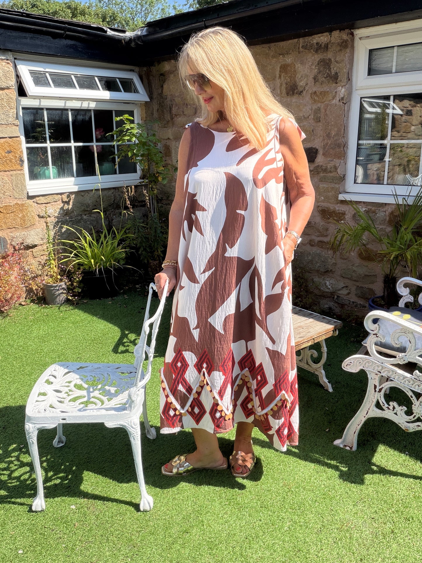 Mila: Leaf printed maxi dress with large rose gold disc detail. One size: 12-18. 2 colours