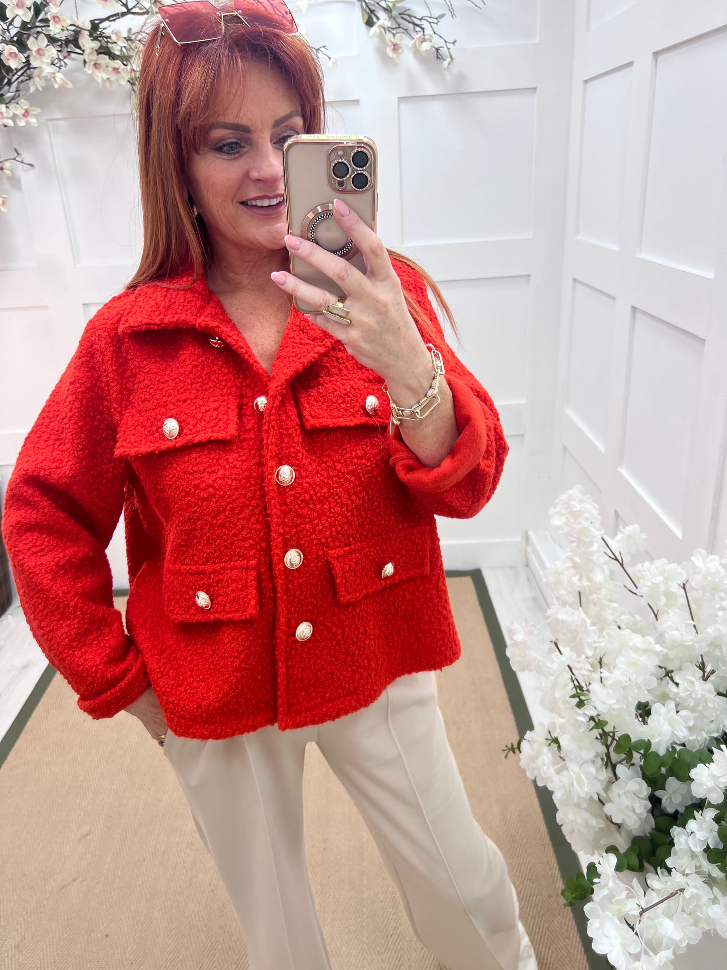 Bridget: Orange short boucle button jacket. One: 12-20