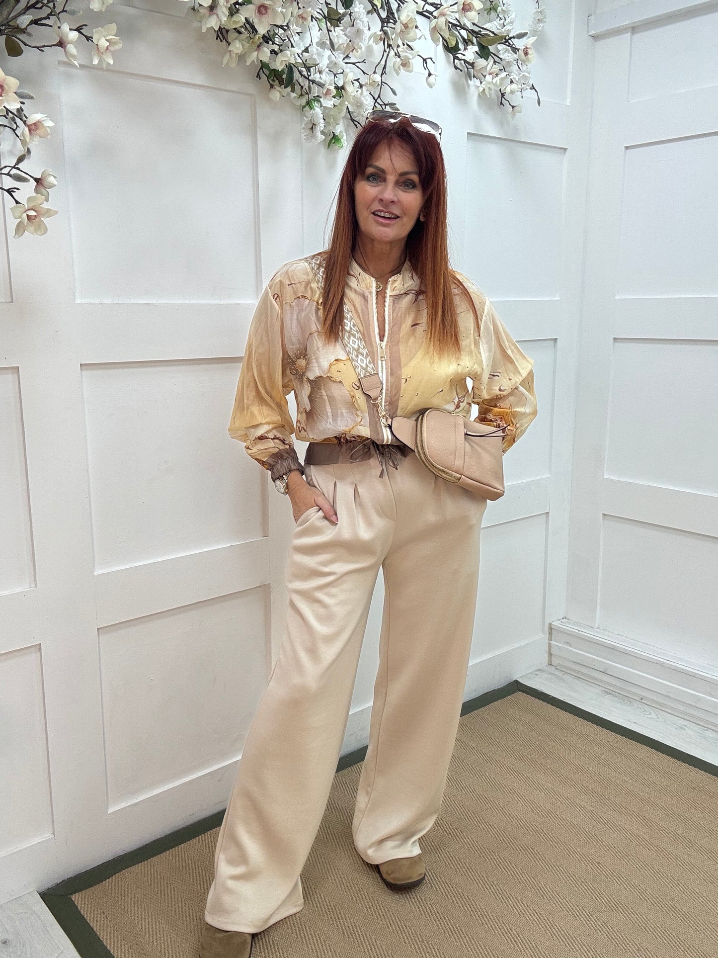 Tayla: Cream high waisted pleated wide leg trousers. One size: 10-16