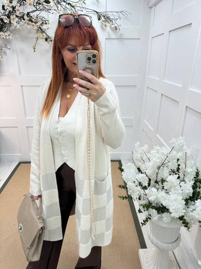 Martha: Cream long pocket cardigan. One size: 12-18
