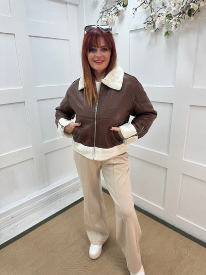 Fiora: Brown faux fur leather jacket. Two sizes