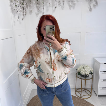 Everly: Silky beige floral bomber jacket. One size: 8-16