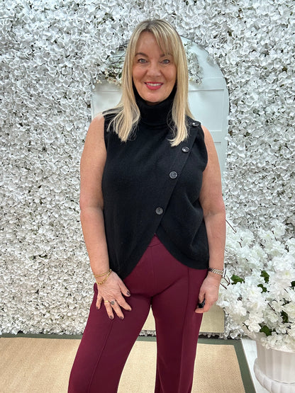 Carmen: Black sleeveless cowl neck wrap top. One Sz: 10- 16