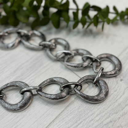 Fallon: Silver chain belt. One size: 8-18