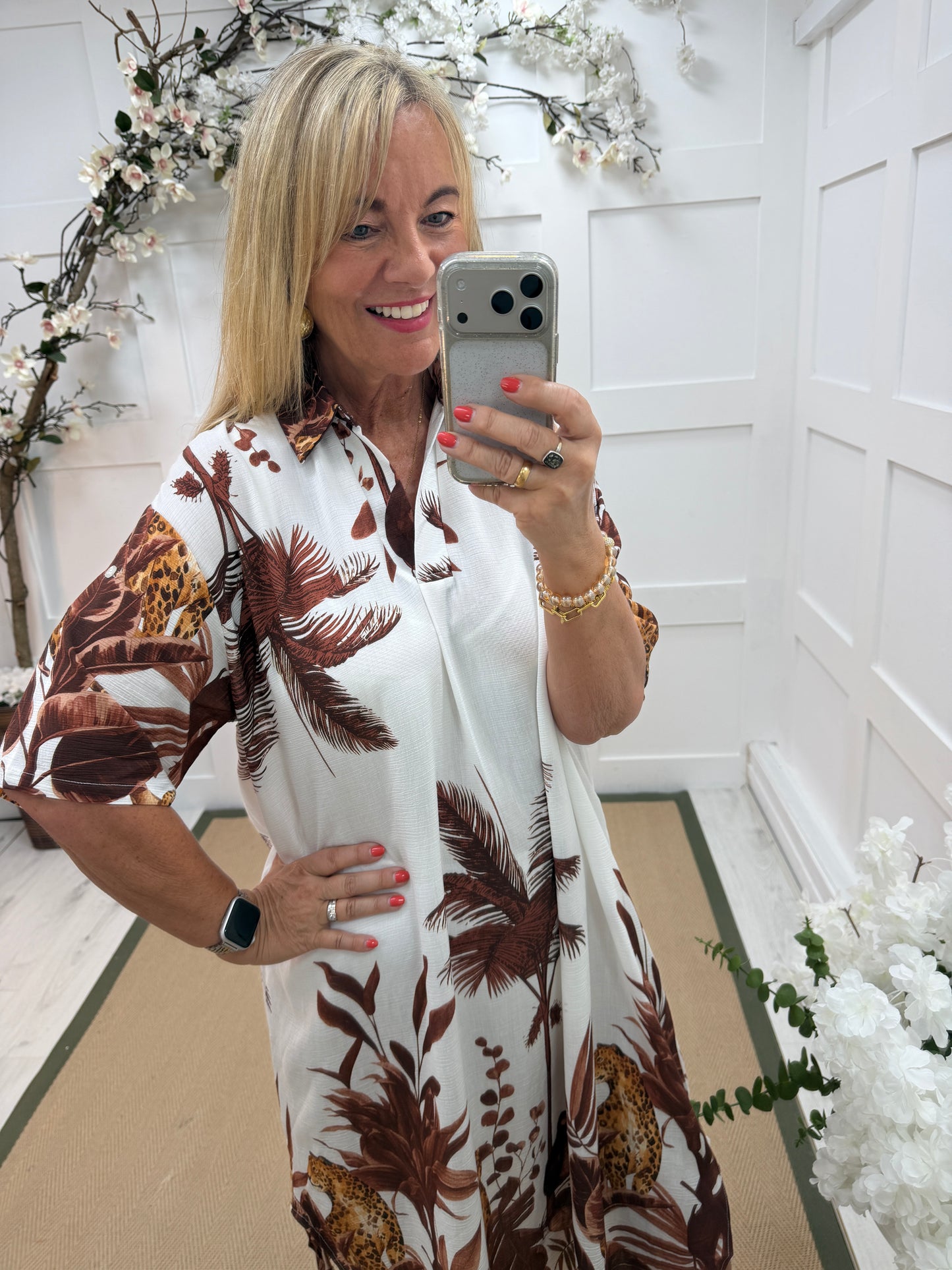 Daniella: Brown & white leaf print V neck midi dress. One size: 16-20