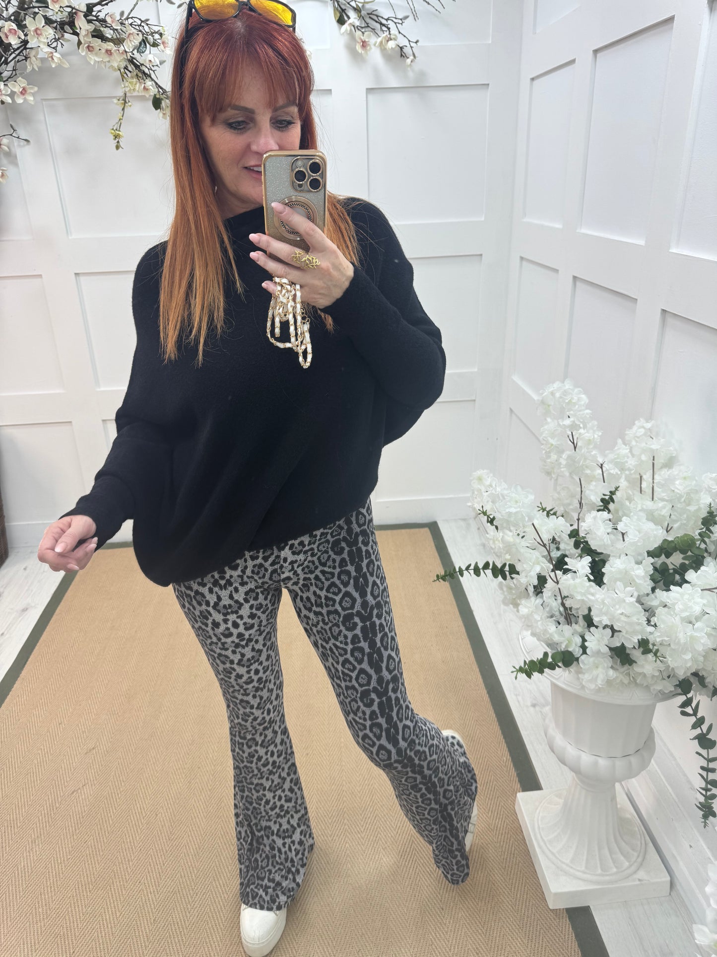 Bekah: Grey leopard print bell bottom flares. 3 sizes