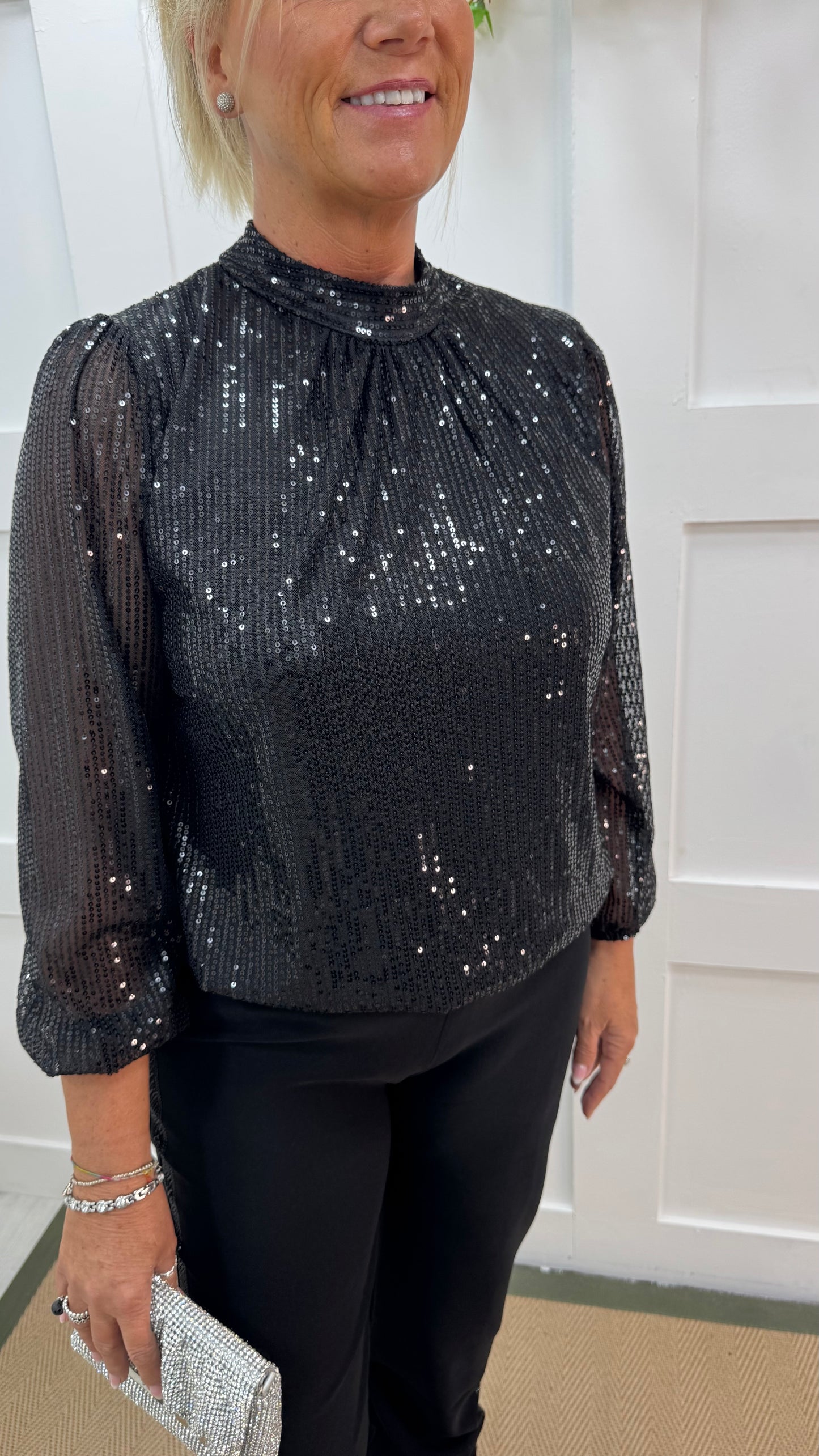 Mia: Black high neck sequin top. One size: 10-16