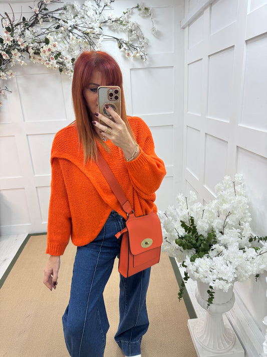 Willow: Orange stretchy short wrap top. One size: 10-18