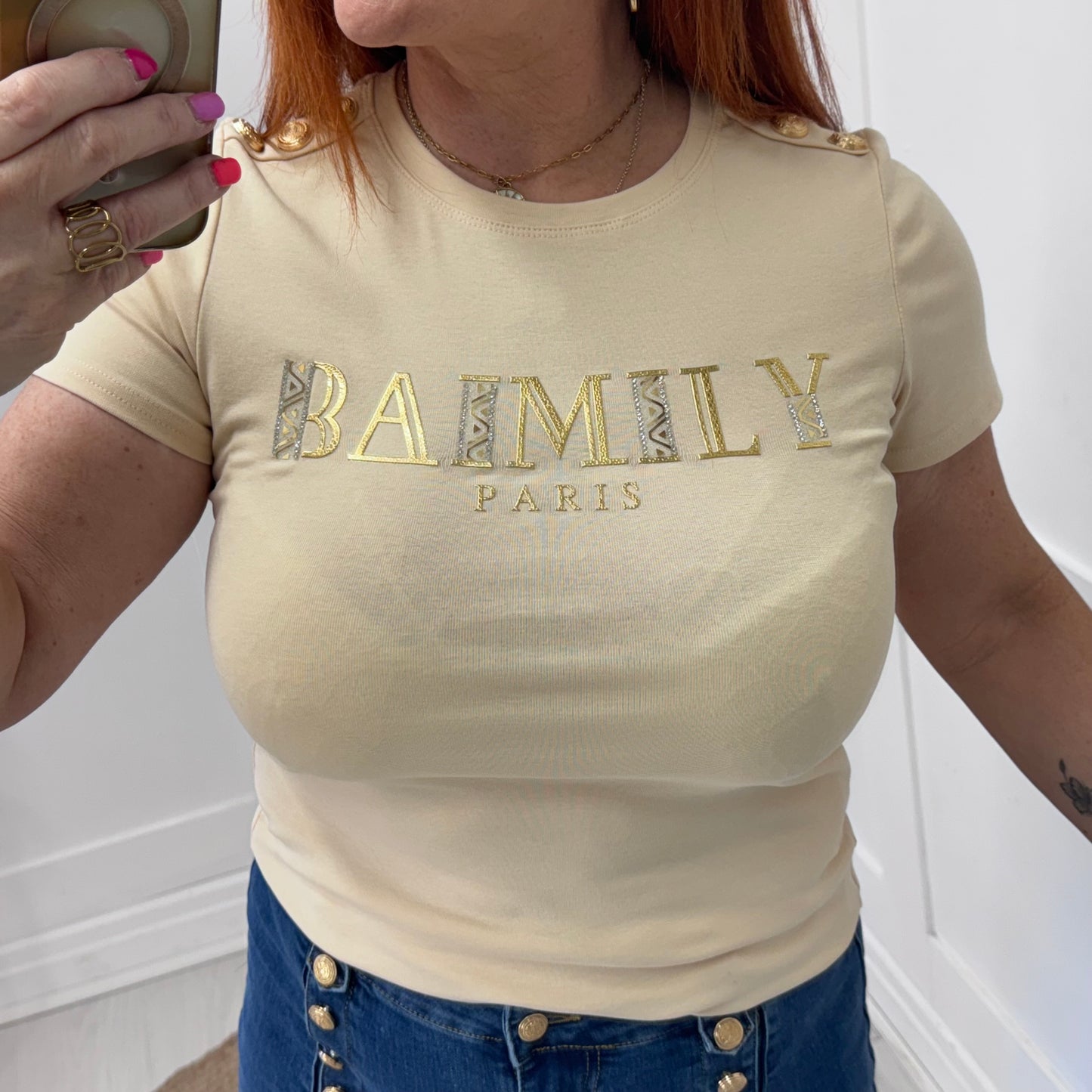 Briana: Cream gold script logo T shirt. 2 sizes