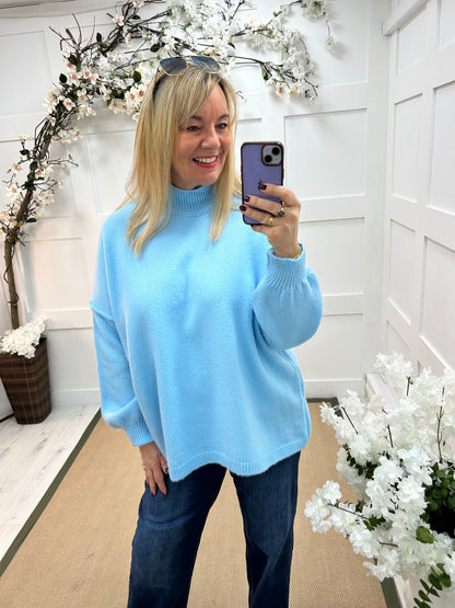 Amy: Baby blue oversized knitted top. One Sz: 14-20