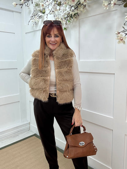 Kizzy: Camel zip up faux fur gilet. One size 8-16
