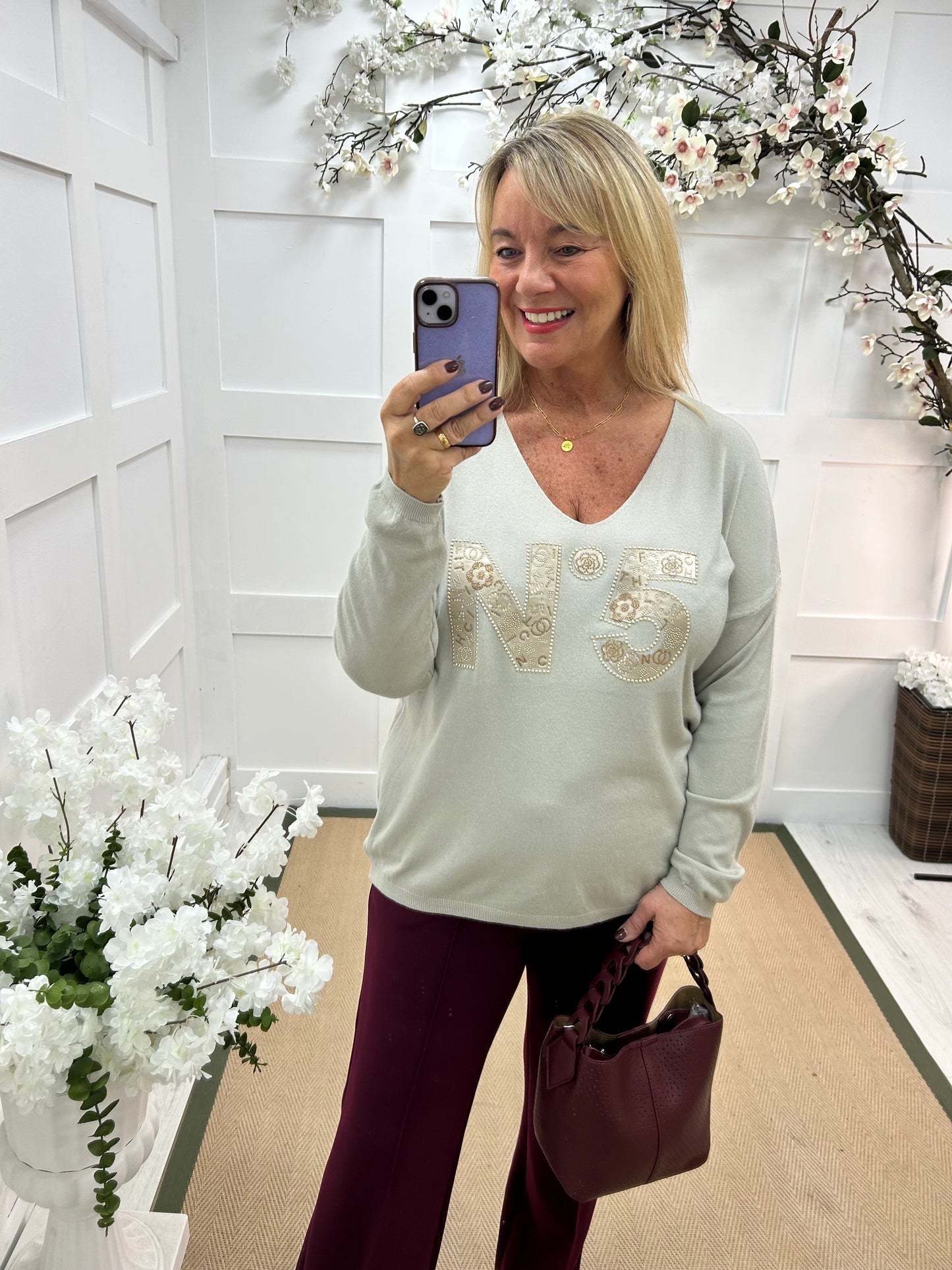 Cass: Stone V neck diamanté No5 knit top. One size: 14-20