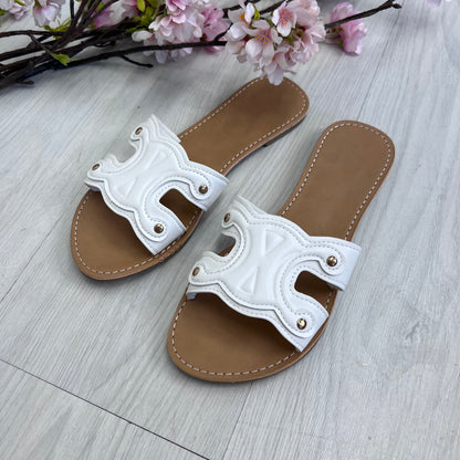 Lucia: white cut out style sliders. Sizes: 4-9