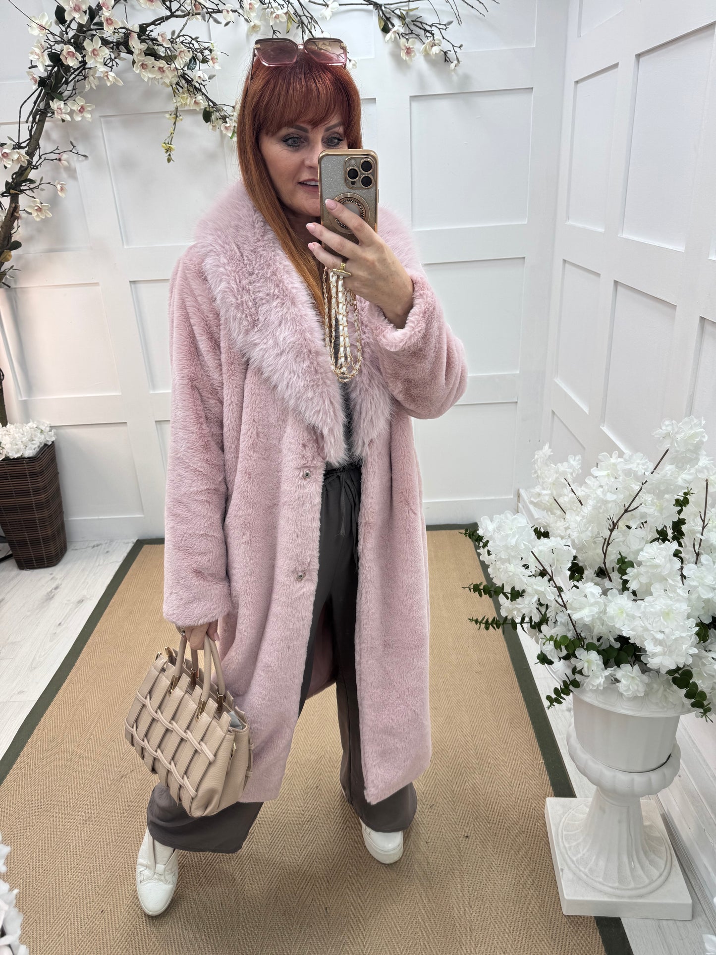 Madeleine: Baby pink long faux fur coat . One size 12-18