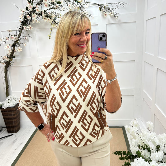 Harper: Cream designer inspired top. One size: 12-18