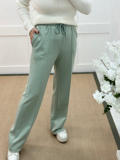 Trudy: Mint green stretchy wide leg pocket trousers. One size: 10-16