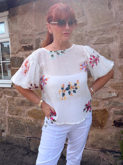 Lucinda: Multicoloured embroidered floral short puff sleeve top. One size: 10-14