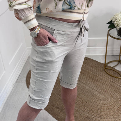 Millie: Cream stretchy magic shorts. One Size 10-18