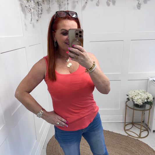 Abigail: Stretchy basic coral vest top. 2 sizes