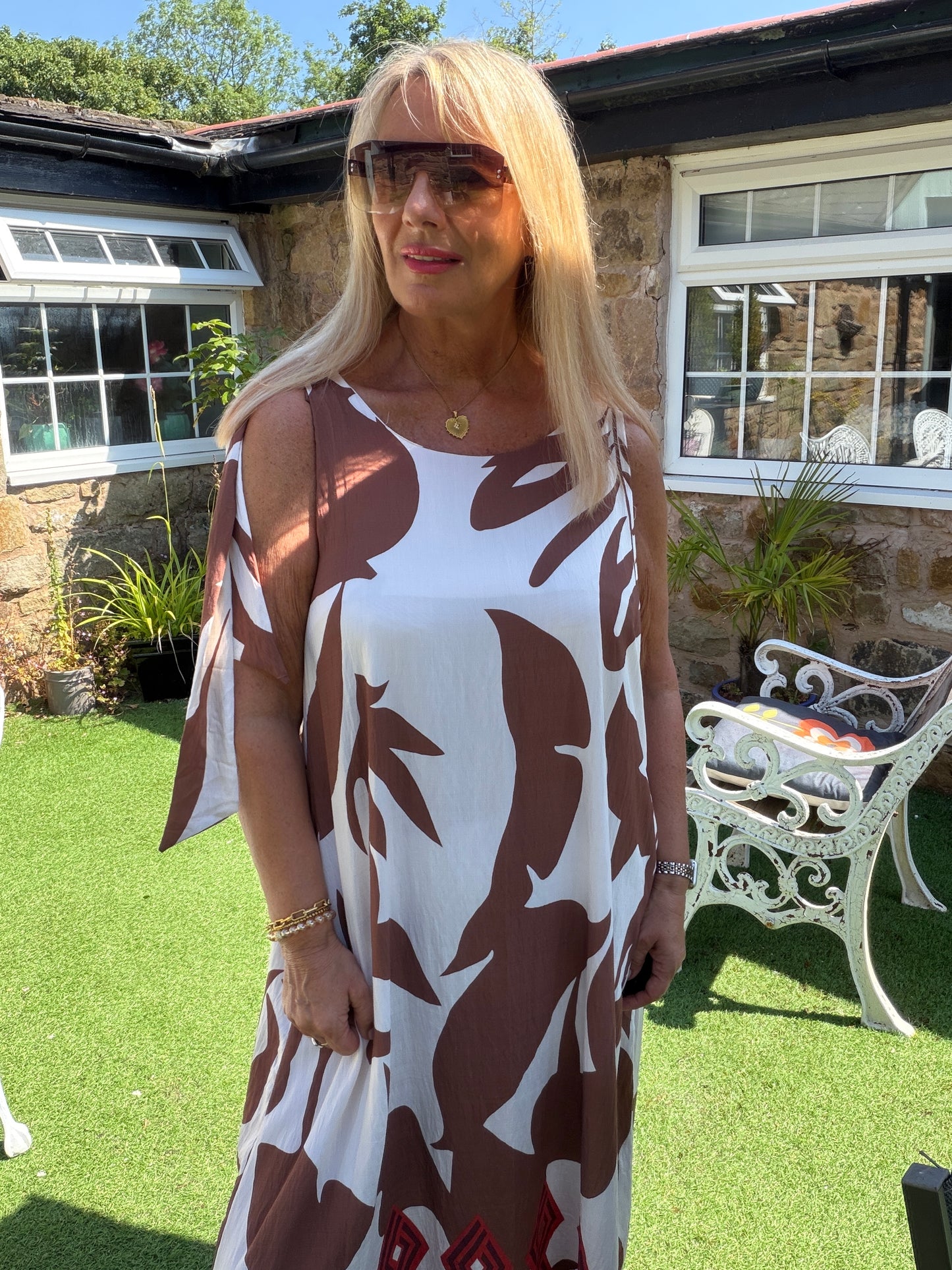Mila: Leaf printed maxi dress with large rose gold disc detail. One size: 12-18. 2 colours