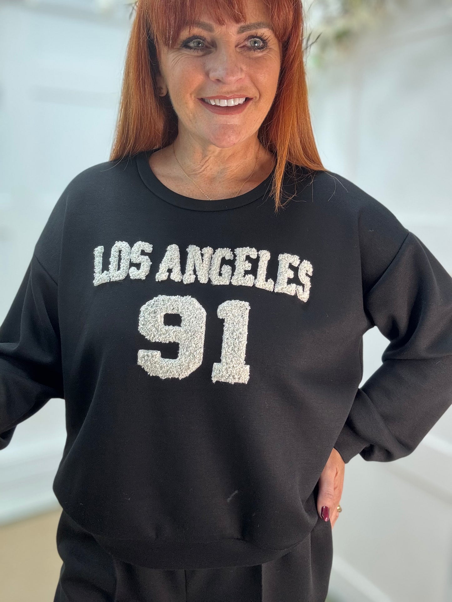 Lake: Black Los Angeles long sleeve top. One size: 12-18