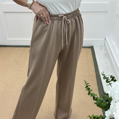 Trudy: Mocha stretchy wide leg pocket trousers. 2 sizes