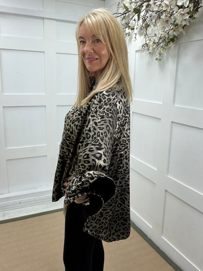 Lauren: Leopard print metallic shirt with statement sleeves. One size: 14-20. 2 colours