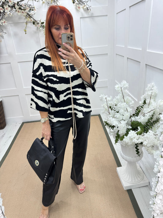 Luna: Zebra print knitted top. One size: 12-18