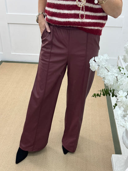 Tabatha: Burgundy faux leather trousers. One size: 12-16