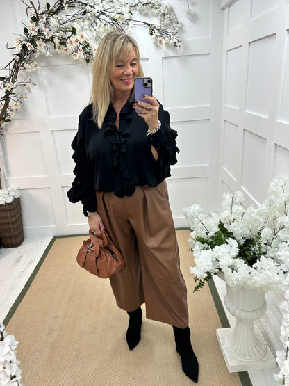 Riley: Black ruffle blouse. One size 14-20