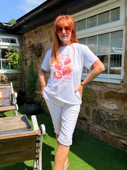 Sophie: White & red strawberry T shirt. One size: 10-16