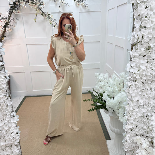 Esme: Cream pocket wide leg trousers. One size: 12-20