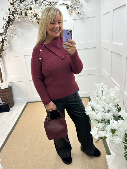 Rumer: Burgundy split neck button top. One size 12-18