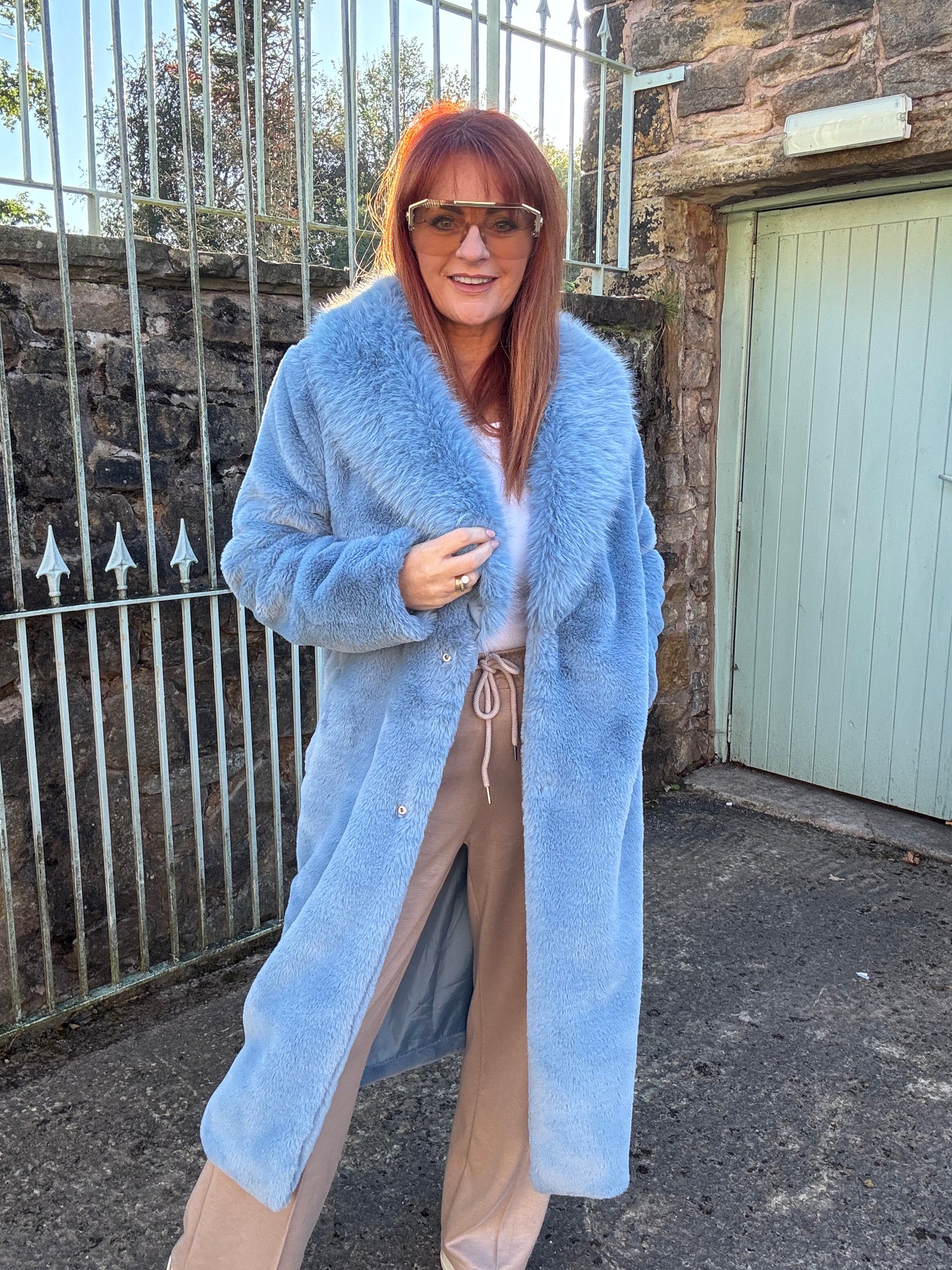 Madeleine: Blue long faux fur coat . One size 12-18