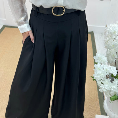 Zina: Black pocket wide leg trousers. One size: 8-14