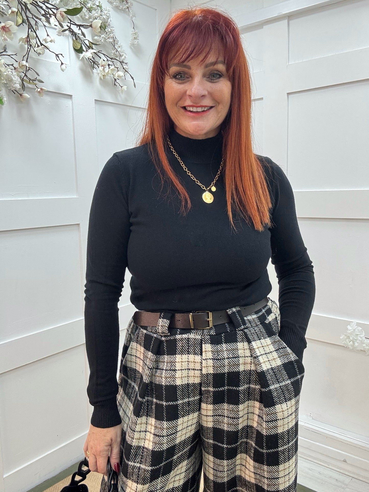 Billie: Black high neckline plain top. Two sizes.