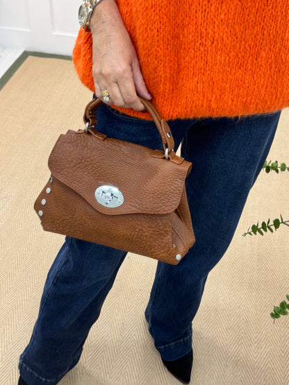 Fauna: Small brown studded grab bag