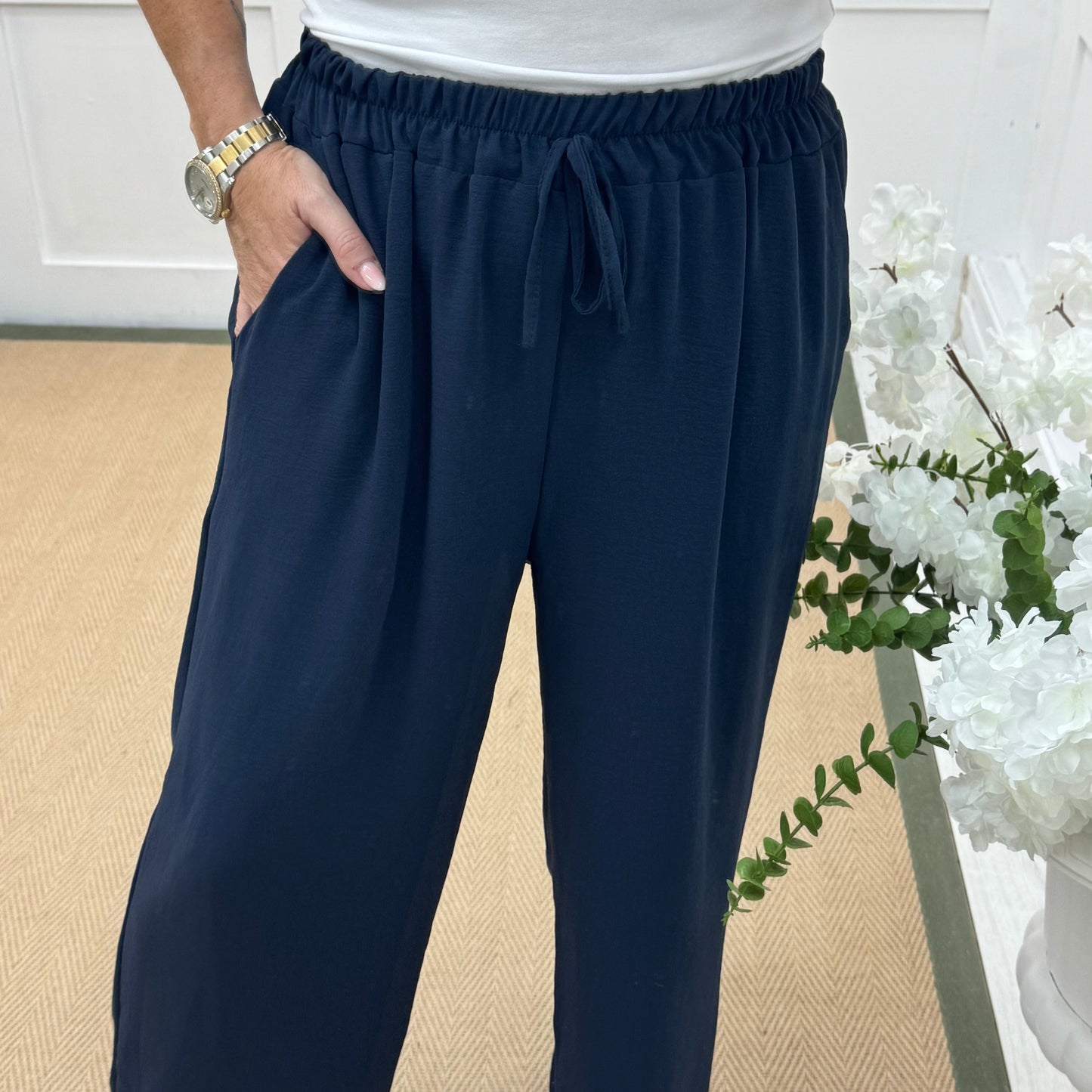 Esme: Navy pocket wide leg trousers. One size: 12-20